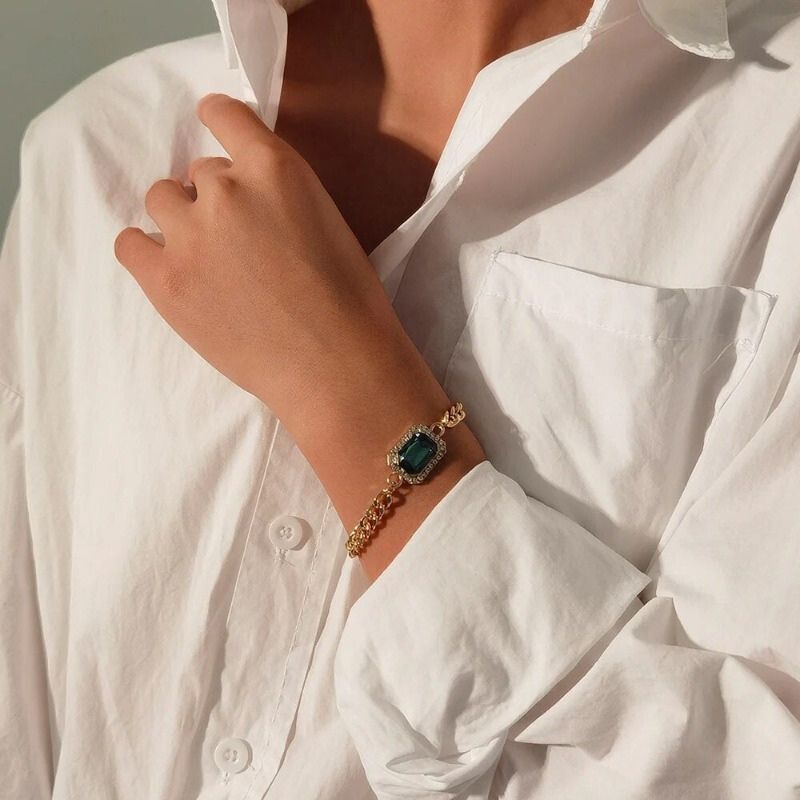 Armband mit Gliedern und Smaragd