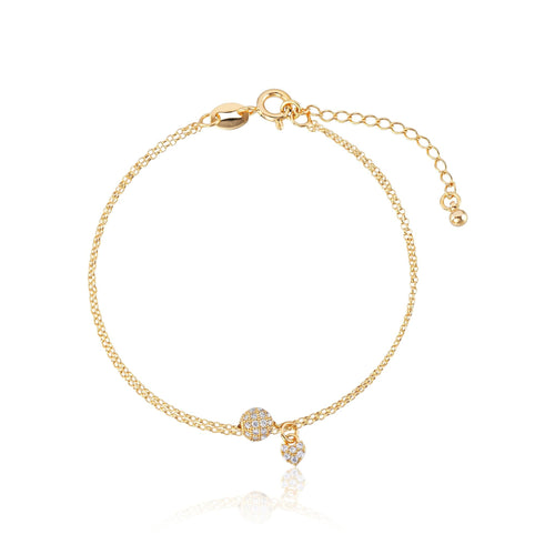 Zartes Armband mit Herz und besetzter Kugel, vergoldet mit 18k Gold