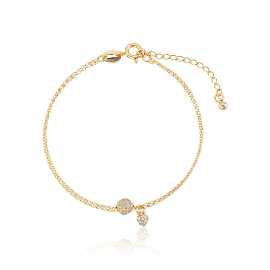 Zartes Armband mit Herz und besetzter Kugel, vergoldet mit 18k Gold
